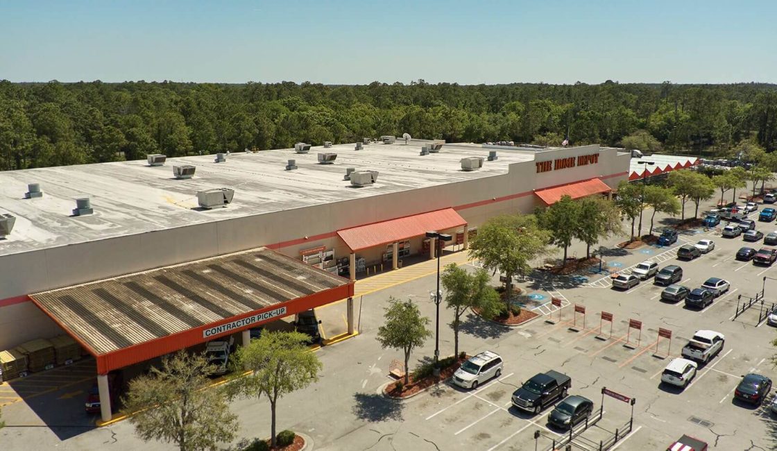 A parking lot with cars parked in it