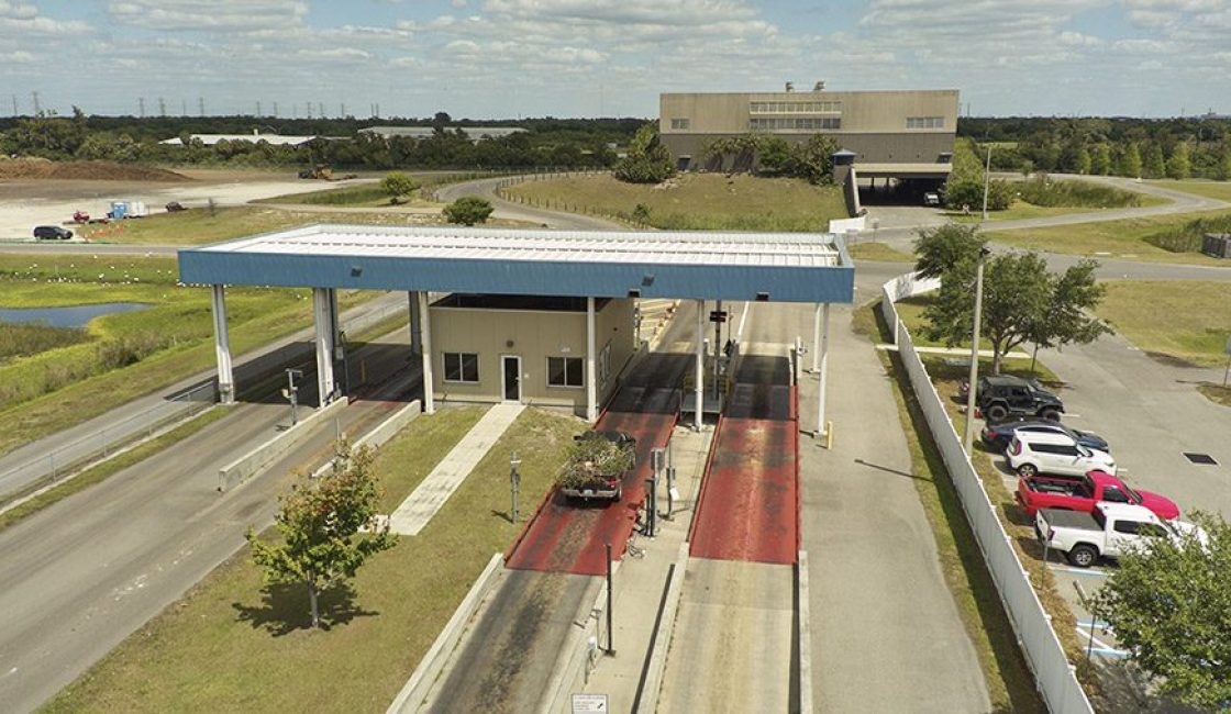 A car is parked at the side of a road.