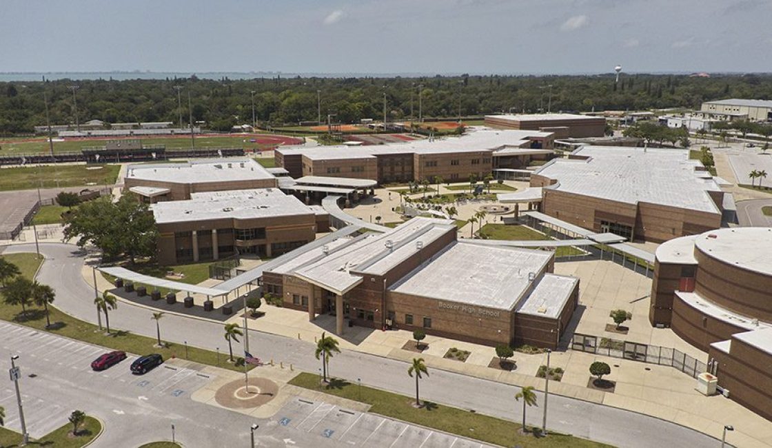 An aerial view of a school with many buildings.