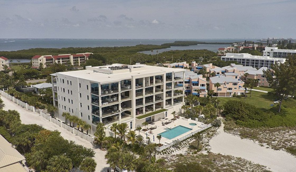 A large building with a pool in the middle of it