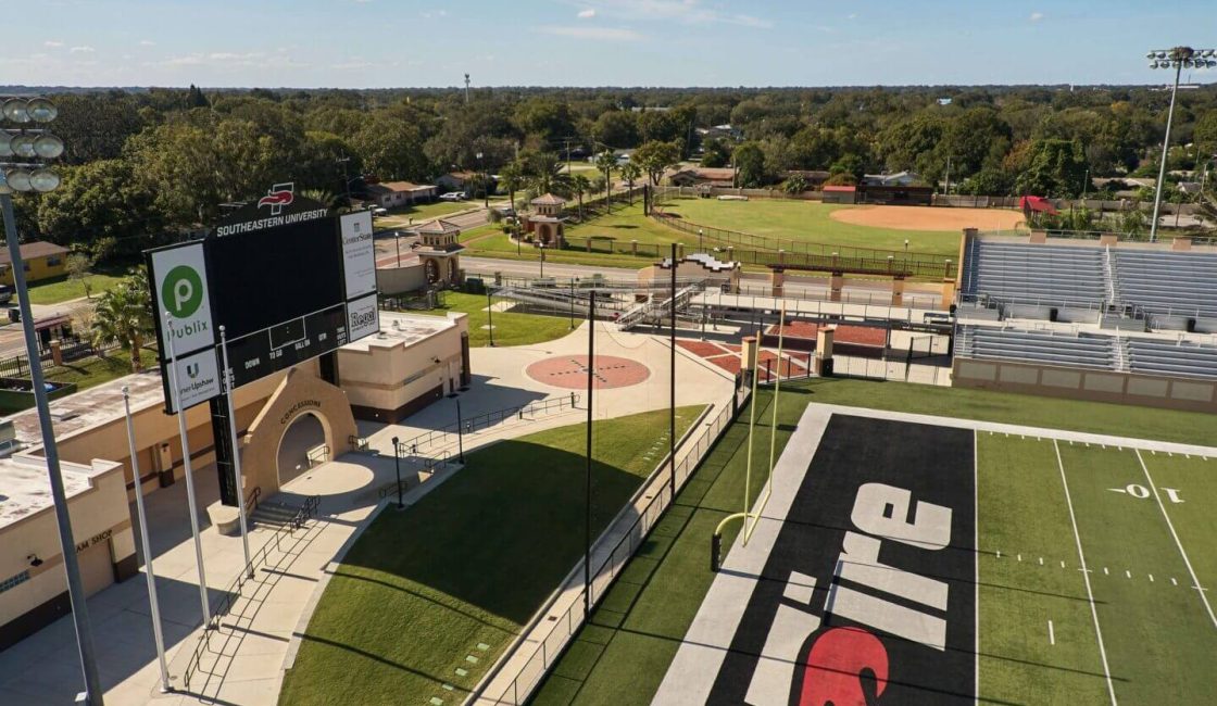 A view of an outdoor stadium with the fire logo on it.