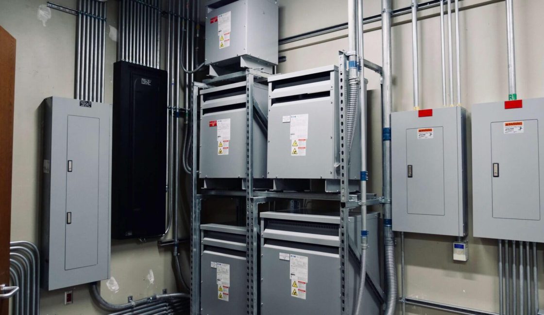 A group of metal cabinets in an industrial setting.